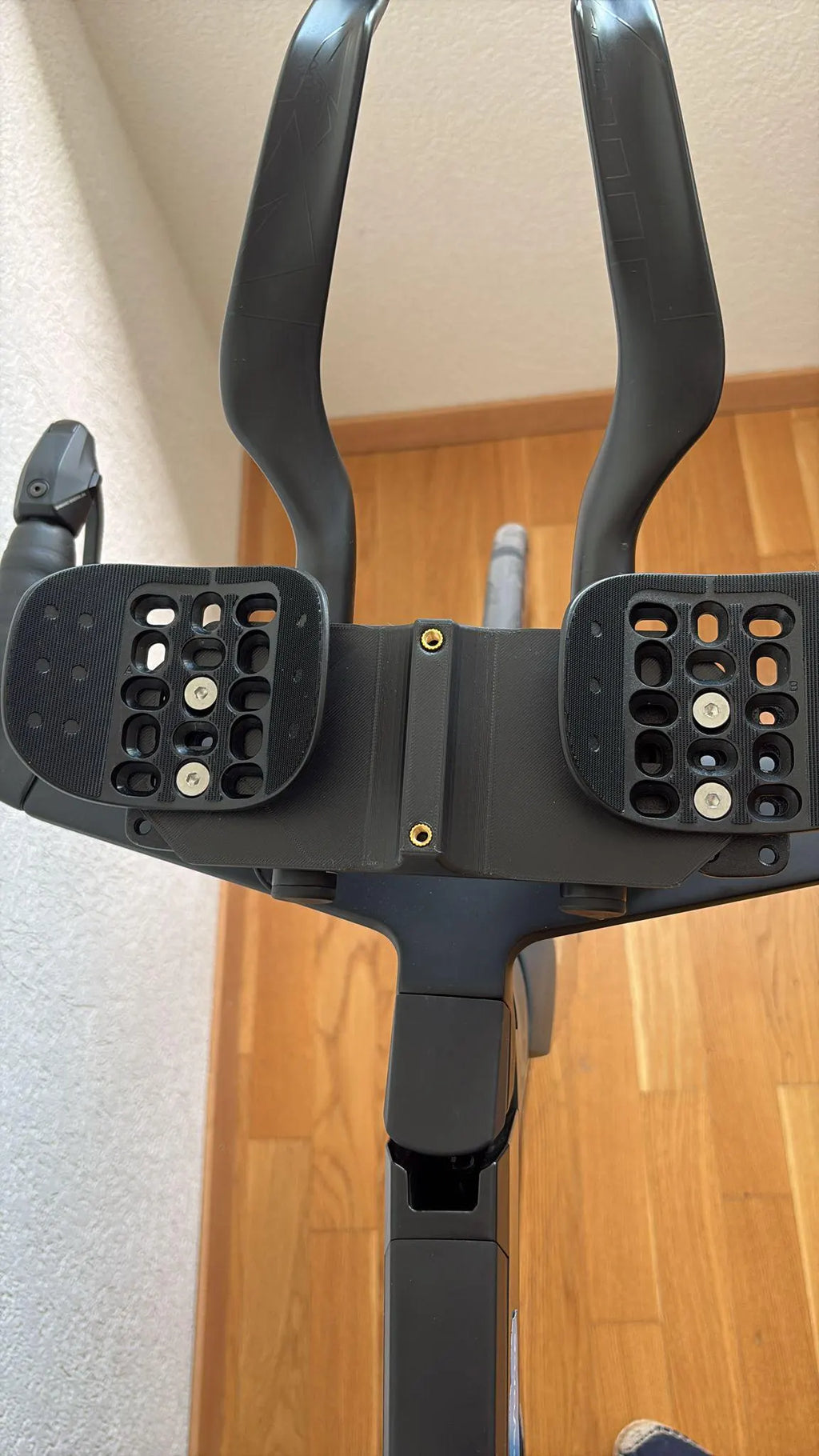 Sistema BTA universal para portabidón entre los acoples - Triatlon